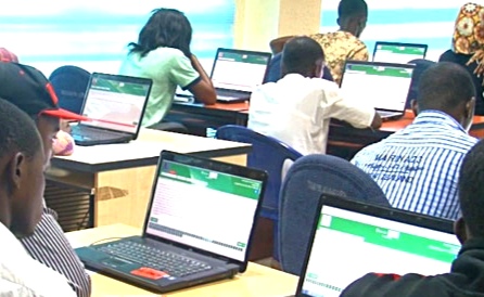 UTME candidates seated in a hall during JAMB examination in Nigeria